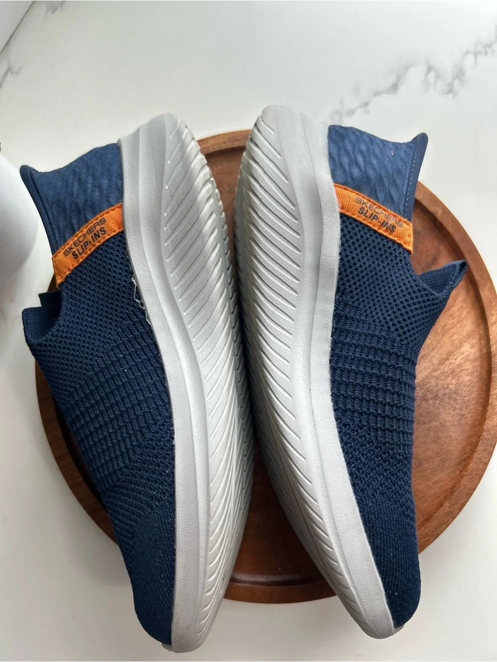 Skechers Kids Navy Slip-On Knit Sneakers with Orange Tabs